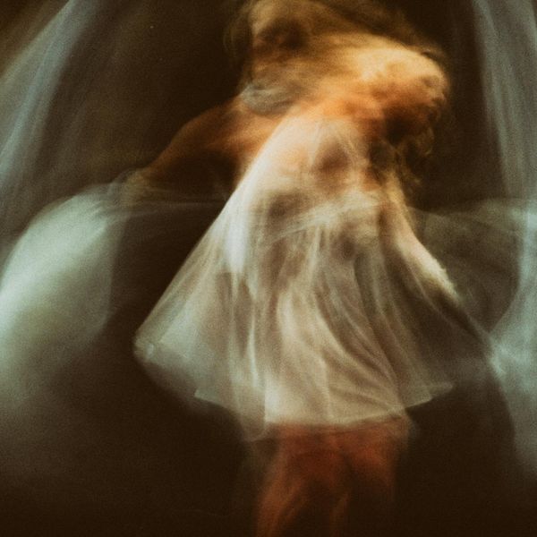 Person in a dynamic and fluid motion, representing vitality and flow.